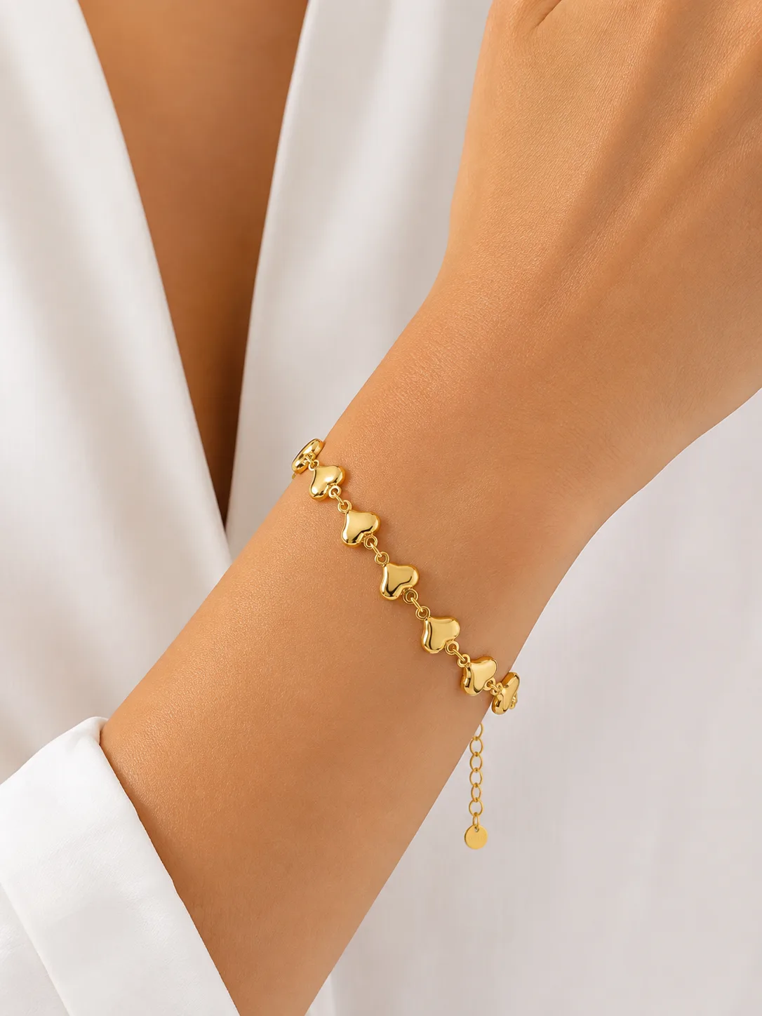 Pulseira DYMONTE Corações Dourados — foto 2
